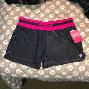 Woman’s size large pink and grey swim shorts